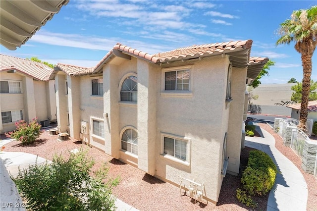 3420 Winterhaven St Unit 202, Las Vegas, NV 89108 - mediterranean / spanish home featuring stucco siding and a tiled roof
