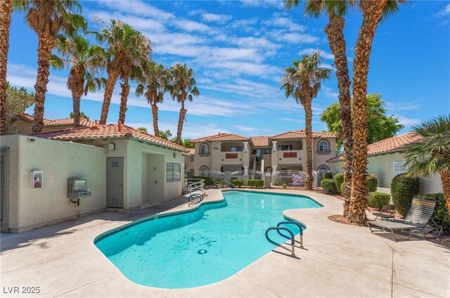 3420 Winterhaven St Unit 202, Las Vegas, NV 89108 - community pool featuring a patio