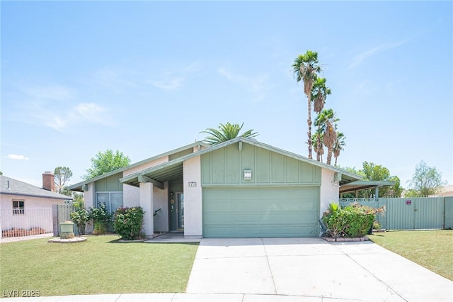 4409 Rosebank Cir, Las Vegas, NV 89108 - mid-century home with a garage, concrete driveway, and board and batten siding