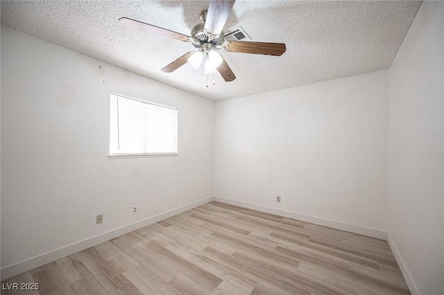 4409 Rosebank Cir, Las Vegas, NV 89108 - empty room featuring a textured ceiling, light wood-style flooring, a ceiling fan, and baseboards
