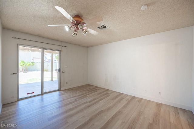 4409 Rosebank Cir, Las Vegas, NV 89108 - unfurnished room with light wood-type flooring, a textured ceiling, ceiling fan, baseboards, and a smoke detector