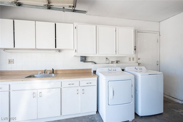 4409 Rosebank Cir, Las Vegas, NV 89108 - laundry area featuring cabinet space and separate washer and dryer