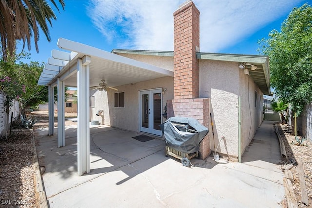 4409 Rosebank Cir, Las Vegas, NV 89108 - rear view of house with french doors, a ceiling fan, stucco siding, a patio, and a fenced backyard