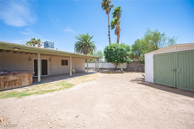 4409 Rosebank Cir, Las Vegas, NV 89108 - view of yard with a hot tub and a patio