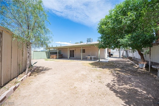 4409 Rosebank Cir, Las Vegas, NV 89108 - rear view of house featuring a fenced backyard and a patio area