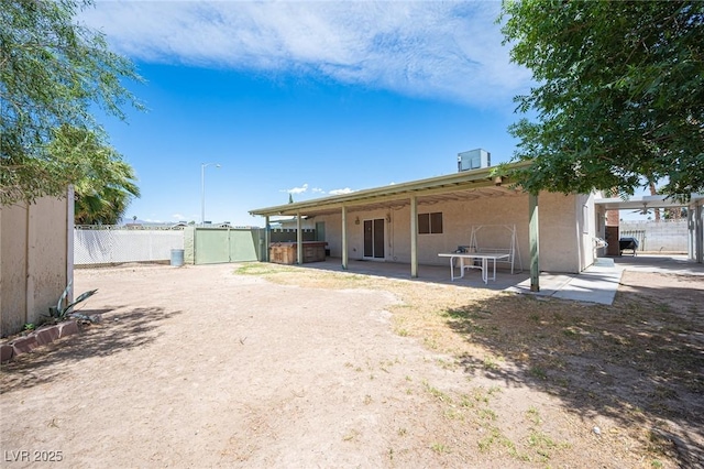 4409 Rosebank Cir, Las Vegas, NV 89108 - back of house with a patio area and stucco siding