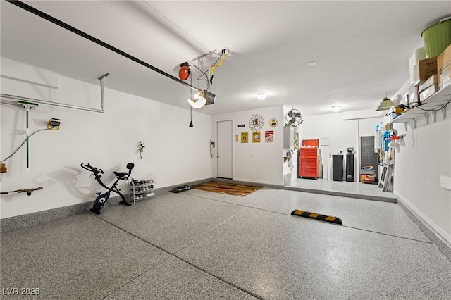 977 Majestic Vw, Mesquite, NV 89034 - garage with a garage door opener and baseboards