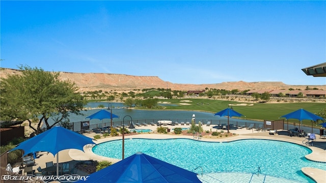 977 Majestic Vw, Mesquite, NV 89034 - community pool featuring a patio area and a water and mountain view
