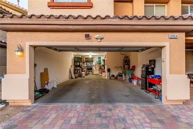 6954 Jacksboro Ct, North Las Vegas, NV 89084 - garage featuring driveway