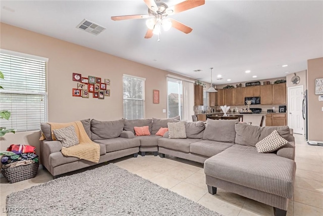6954 Jacksboro Ct, North Las Vegas, NV 89084 - living area with ceiling fan, light tile patterned floors, and recessed lighting