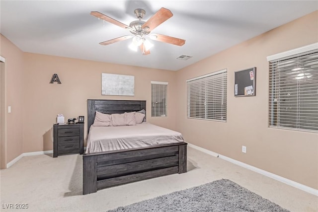 6954 Jacksboro Ct, North Las Vegas, NV 89084 - carpeted bedroom with baseboards and ceiling fan