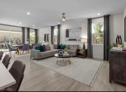 737 Wild Highlands Ln, Henderson, NV 89015 - living area featuring plenty of natural light, wood finished floors, ceiling fan, and recessed lighting