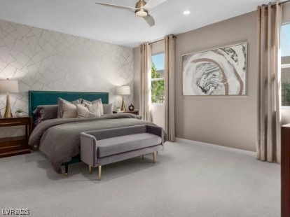 737 Wild Highlands Ln, Henderson, NV 89015 - bedroom with an accent wall, carpet, baseboards, a ceiling fan, and recessed lighting