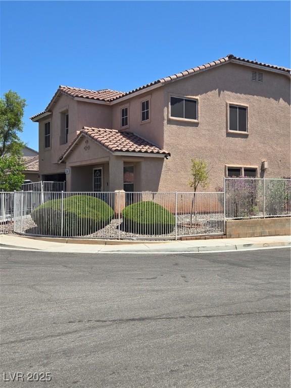 3954 Crystal Trip Ct, Las Vegas, NV 89129 - view of front of house featuring stucco siding and a tile roof