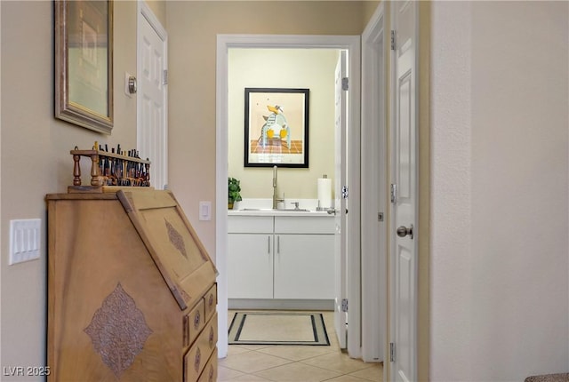 6440 Bristlebird St, North Las Vegas, NV 89084 - doorway featuring a sink and light tile patterned floors
