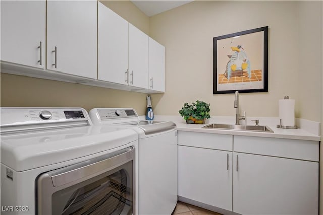 6440 Bristlebird St, North Las Vegas, NV 89084 - laundry area featuring independent washer and dryer and cabinet space
