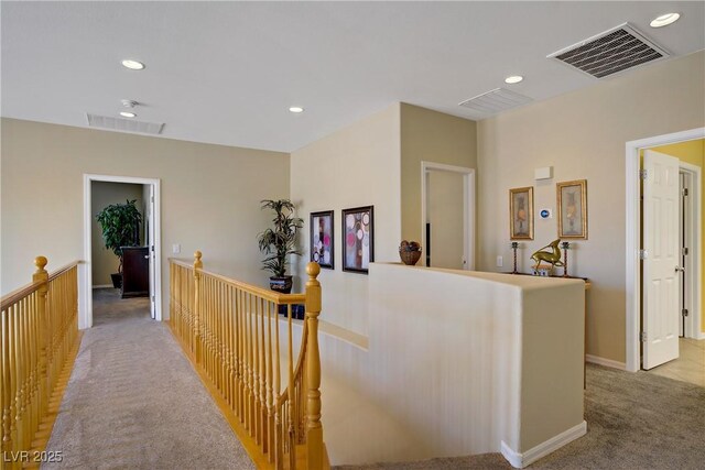 6440 Bristlebird St, North Las Vegas, NV 89084 - hall with an upstairs landing, carpet, recessed lighting, and baseboards