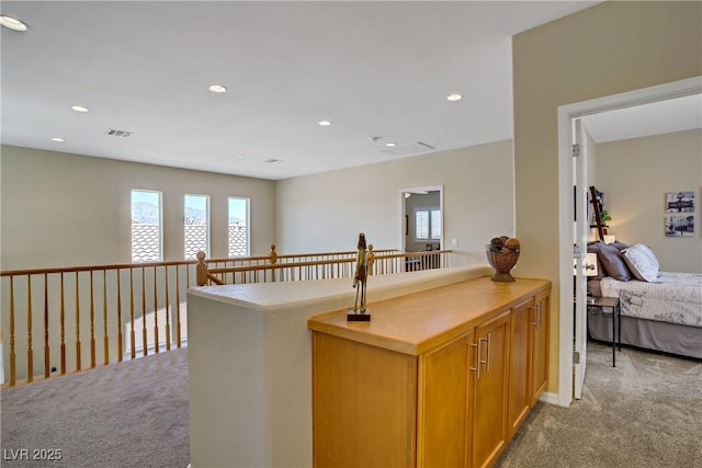 6440 Bristlebird St, North Las Vegas, NV 89084 - corridor featuring light carpet and recessed lighting