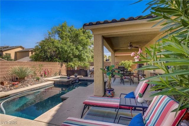 6440 Bristlebird St, North Las Vegas, NV 89084 - view of swimming pool featuring ceiling fan, a fenced backyard, a patio, and outdoor dining space