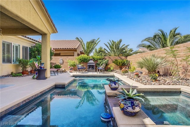 6440 Bristlebird St, North Las Vegas, NV 89084 - view of pool featuring a fenced backyard and a patio area