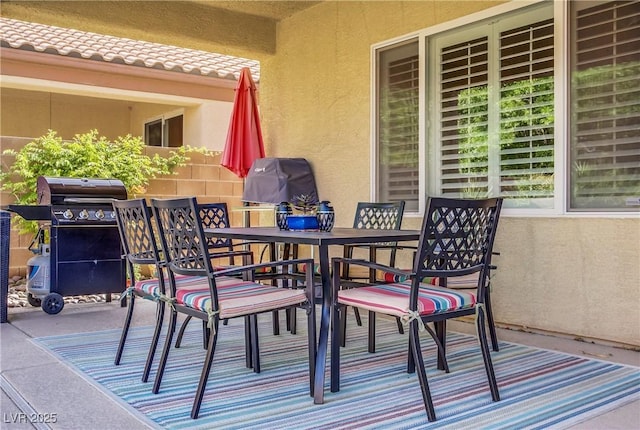 6440 Bristlebird St, North Las Vegas, NV 89084 - view of patio / terrace featuring outdoor dining area and grilling area
