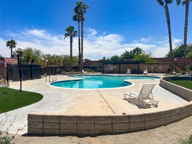 6445 Ironbark Ln, Las Vegas, NV 89107 - community pool featuring a patio