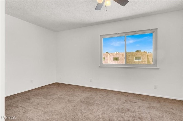 6445 Ironbark Ln, Las Vegas, NV 89107 - carpeted spare room featuring a textured ceiling, ceiling fan, and baseboards