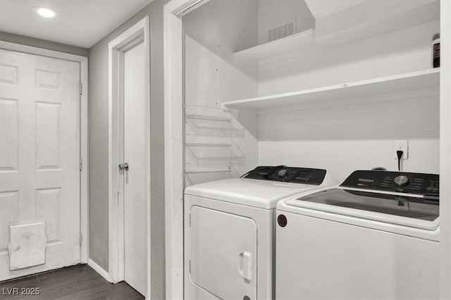 6445 Ironbark Ln, Las Vegas, NV 89107 - laundry room with washer and clothes dryer, dark wood-style floors, recessed lighting, and baseboards