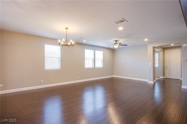 2369 Via Barranca St, Henderson, NV 89044 - empty room featuring a chandelier, baseboards, ceiling fan, dark wood-type flooring, and recessed lighting