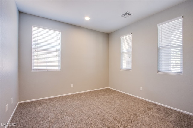 2369 Via Barranca St, Henderson, NV 89044 - spare room featuring carpet flooring, plenty of natural light, baseboards, and recessed lighting