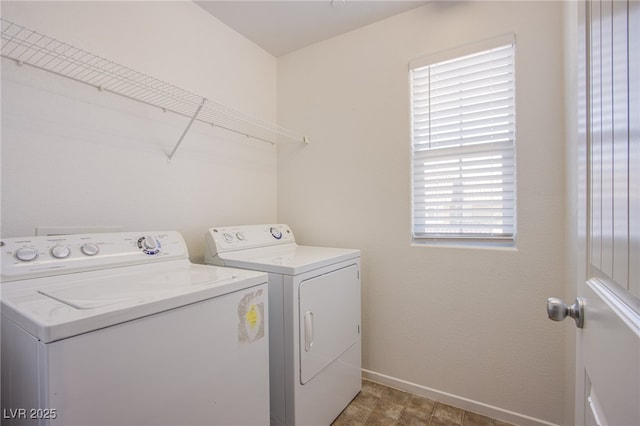 2369 Via Barranca St, Henderson, NV 89044 - laundry room with washer and dryer and baseboards