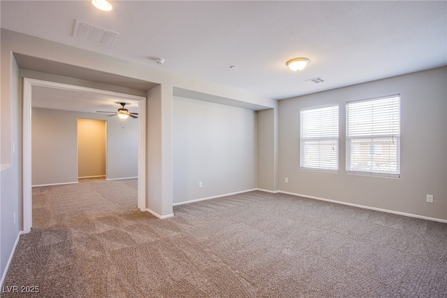 2369 Via Barranca St, Henderson, NV 89044 - carpeted empty room with a ceiling fan, baseboards, and a smoke detector