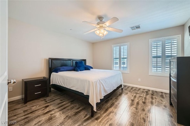 9050 W Tropicana Ave Unit 1015, Las Vegas, NV 89147 - bedroom with wood finished floors, baseboards, and ceiling fan