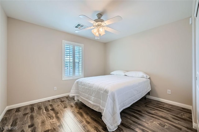 9050 W Tropicana Ave Unit 1015, Las Vegas, NV 89147 - bedroom with wood finished floors, baseboards, and ceiling fan