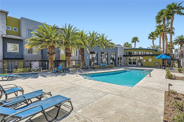 9050 W Tropicana Ave Unit 1015, Las Vegas, NV 89147 - community pool with a patio