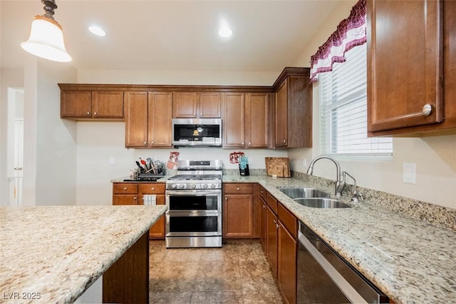 132 Soaring Sky Ave, Henderson, NV 89011 - kitchen with stainless steel appliances, a sink, light stone counters, decorative light fixtures, and recessed lighting