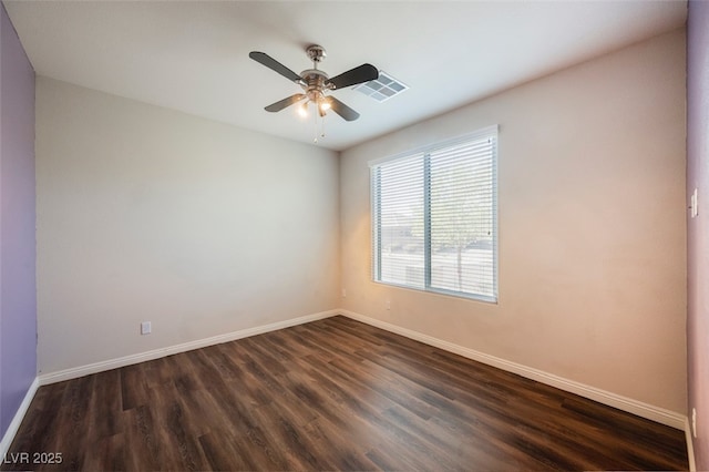 132 Soaring Sky Ave, Henderson, NV 89011 - spare room featuring dark wood-style floors, baseboards, and ceiling fan