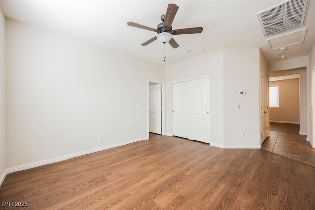 132 Soaring Sky Ave, Henderson, NV 89011 - unfurnished room with wood finished floors, baseboards, and ceiling fan