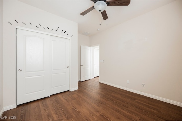 132 Soaring Sky Ave, Henderson, NV 89011 - unfurnished bedroom with wood finished floors, baseboards, a closet, and ceiling fan
