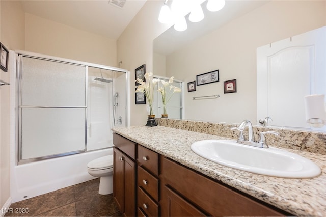 132 Soaring Sky Ave, Henderson, NV 89011 - bathroom with vanity, toilet, and bath / shower combo with glass door