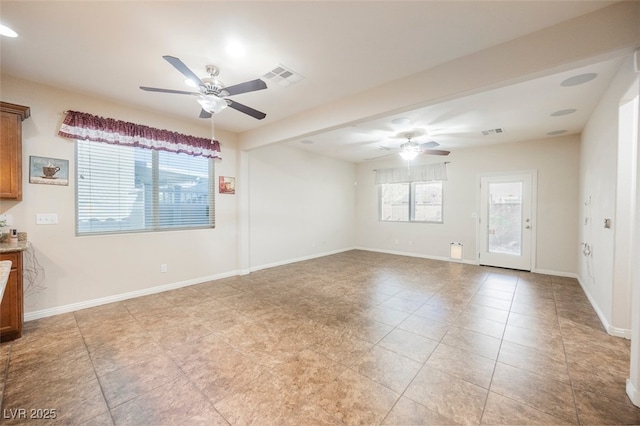 132 Soaring Sky Ave, Henderson, NV 89011 - unfurnished room featuring a ceiling fan, plenty of natural light, and light tile patterned flooring