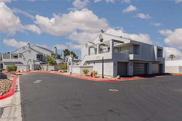 5523 Orchard Ln Unit 0, Las Vegas, NV 89110 - view of asphalt road featuring a residential view, curbs, and street lighting
