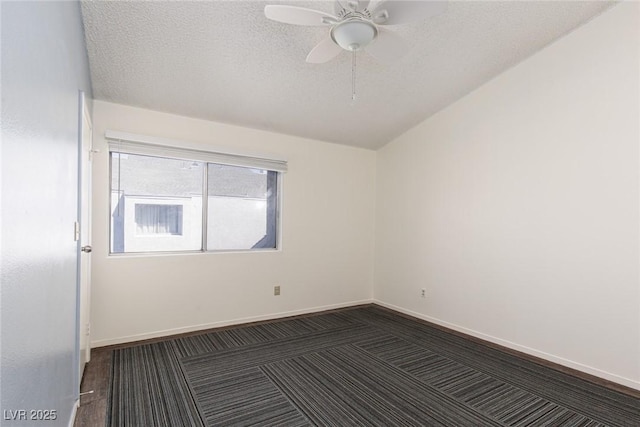 5523 Orchard Ln Unit 0, Las Vegas, NV 89110 - empty room featuring ceiling fan, baseboards, lofted ceiling, and a textured ceiling