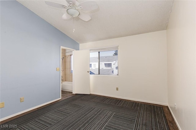 5523 Orchard Ln Unit 0, Las Vegas, NV 89110 - carpeted spare room with lofted ceiling, ceiling fan, baseboards, and a textured ceiling