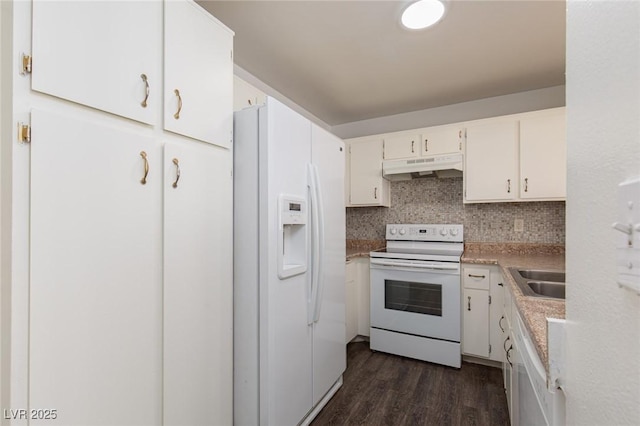 5523 Orchard Ln Unit 0, Las Vegas, NV 89110 - kitchen featuring white appliances, under cabinet range hood, light countertops, backsplash, and dark wood-style flooring