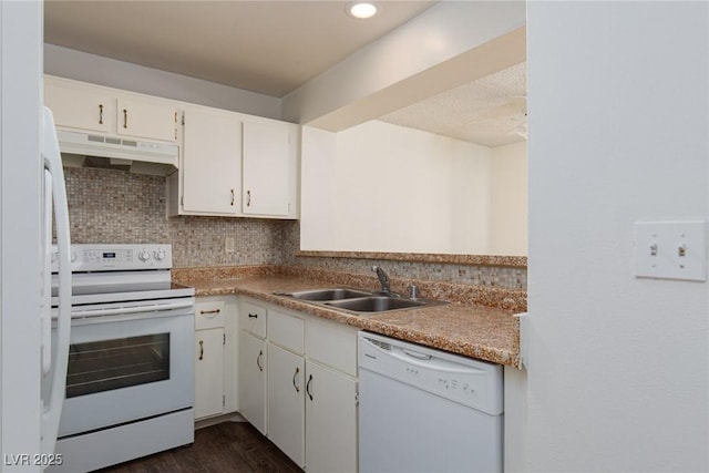 5523 Orchard Ln Unit 0, Las Vegas, NV 89110 - kitchen featuring white appliances, a sink, under cabinet range hood, decorative backsplash, and white cabinetry