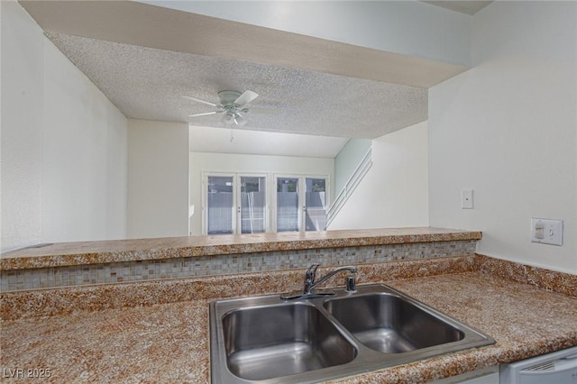 5523 Orchard Ln Unit 0, Las Vegas, NV 89110 - kitchen featuring a sink, ceiling fan, dishwasher, and a textured ceiling