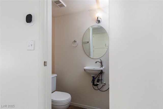 5523 Orchard Ln Unit 0, Las Vegas, NV 89110 - half bath featuring toilet and baseboards