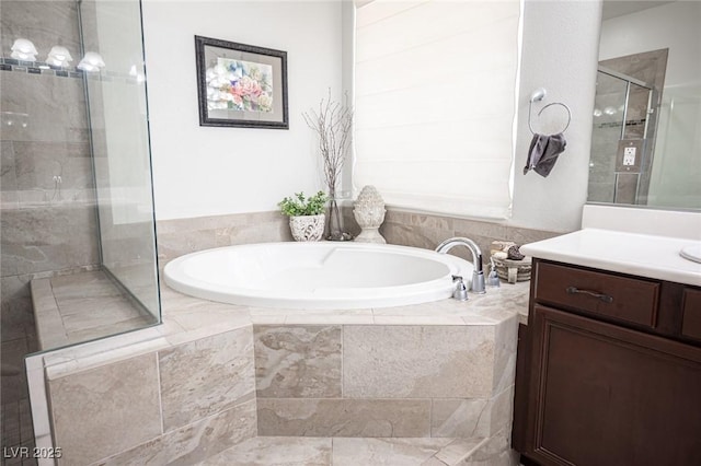 7538 Mustang St, Las Vegas, NV 89131 - bathroom with vanity, a bath, and a stall shower