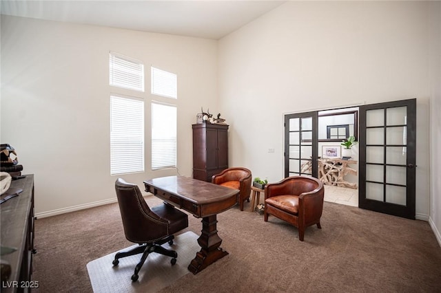 7538 Mustang St, Las Vegas, NV 89131 - home office featuring carpet flooring, a towering ceiling, french doors, and baseboards